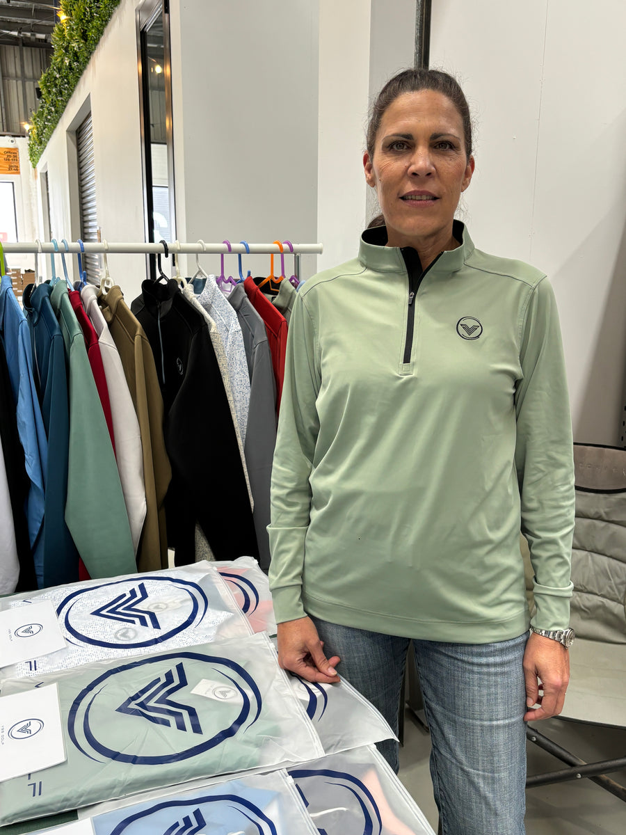Female golfer fit example – lightweight quarter-zip