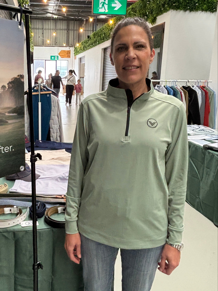 Female golfer fit example – lightweight quarter-zip