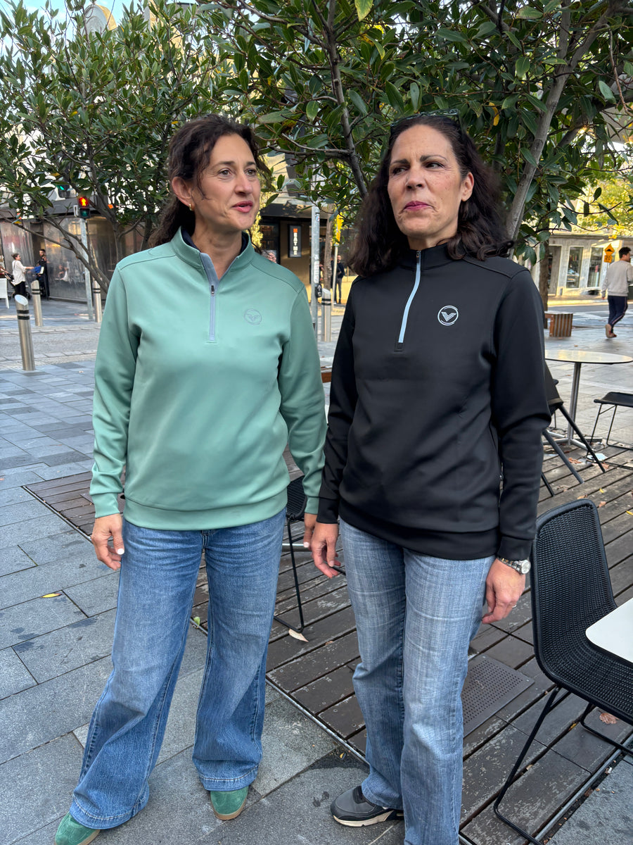 Female golfer fit example – quarter-zip